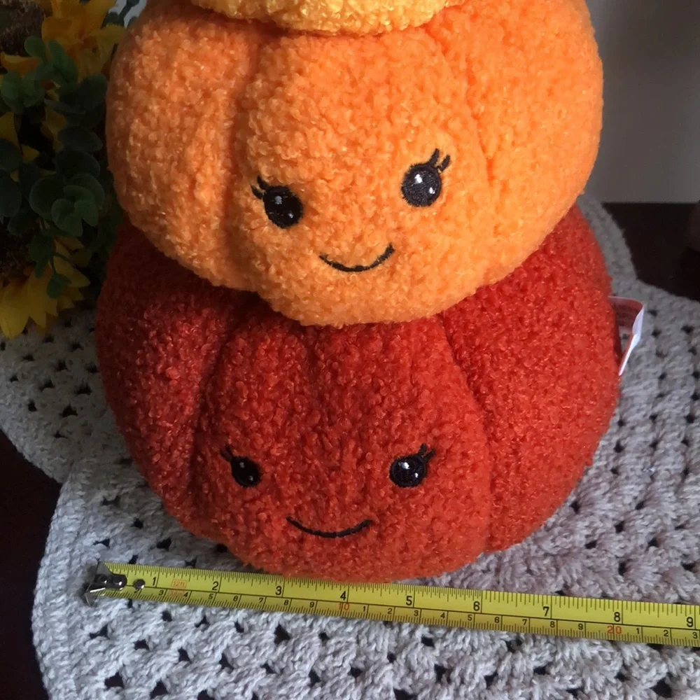Stacked SHERPA Pumpkins with Smiley Faces